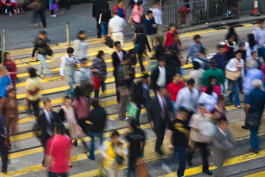 people crossing at the pedestrian lane